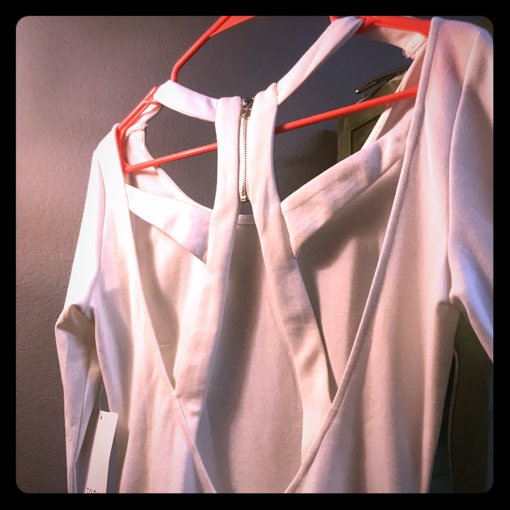White long sleeve strappy back body con dress